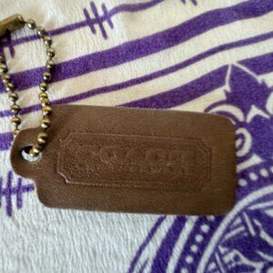 Coach hangtag - Putty